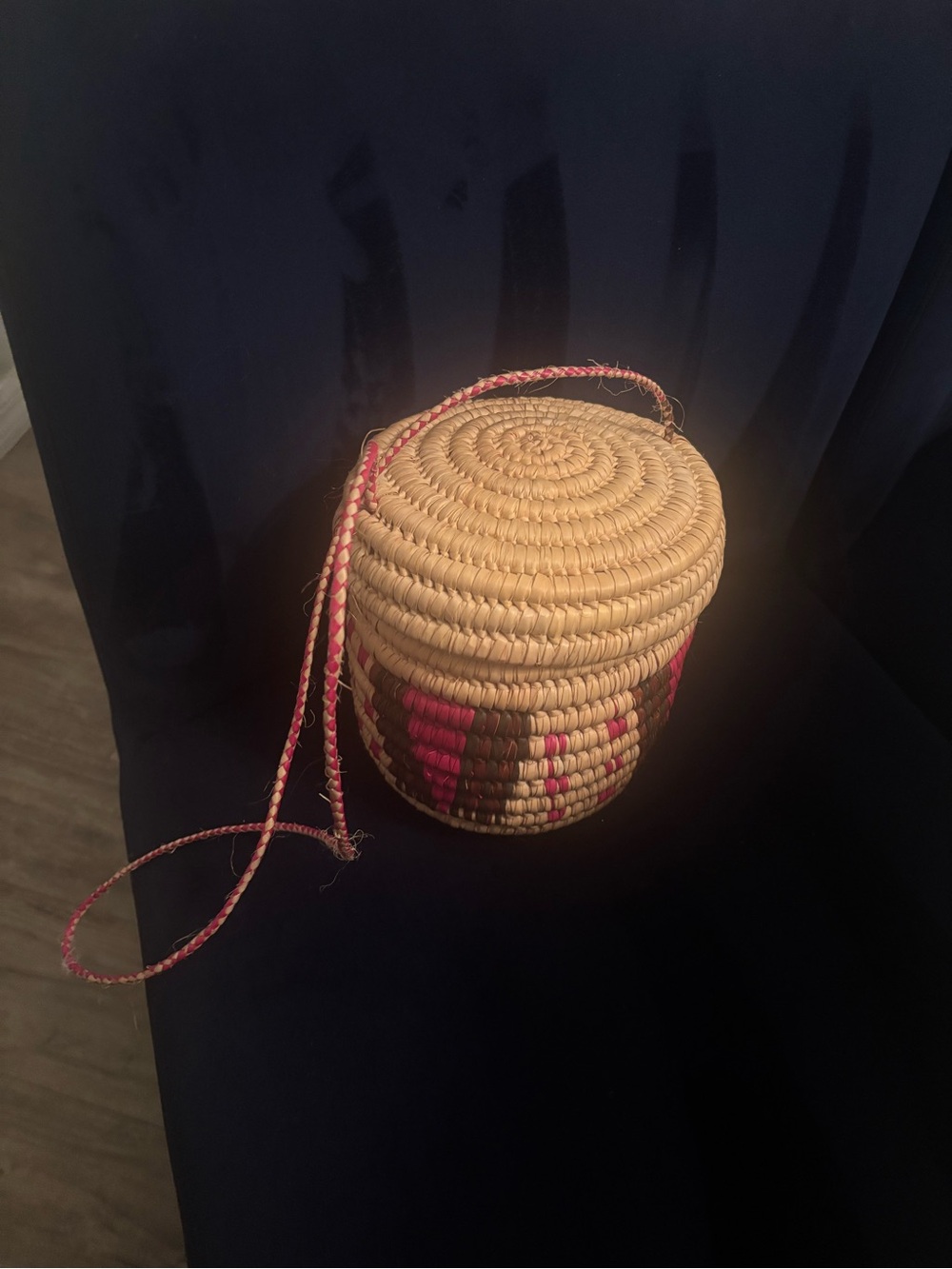 Handwoven Round Straw Crossbody Bag with Pink Accent Strap